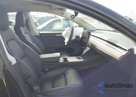 2023 Tesla Model Y Rwd from USA, damaged, VIN 7SAYGDED3PF923668